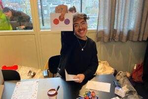 A21 Legal team volunteers creating welcome cards