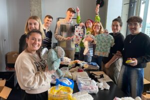 A21 Legal team volunteers packing